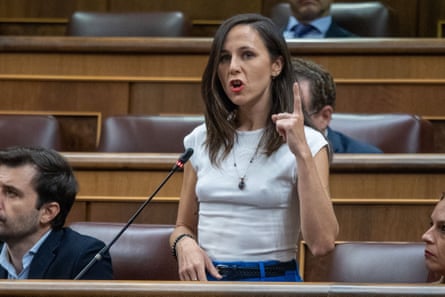 a woman in front of a microphone