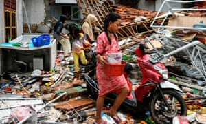 Residents recover what they can from their homes following the deadly tsunami that hit off the Indonesian island of Java.