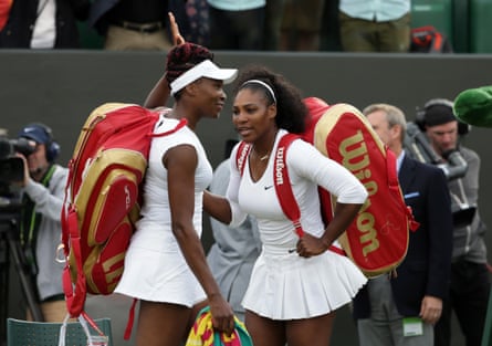 Serena Williams and sister Venus on court at Wimbledon in 2016