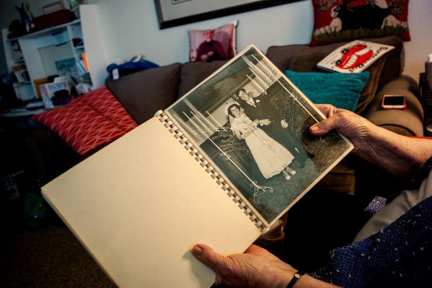 Juanita Erickson leafs through the album of her first wedding with her husband, who died in a small plane crash.