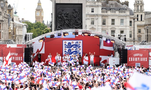 England players celebrate with fans in Trafalgar Square, 1 August.
