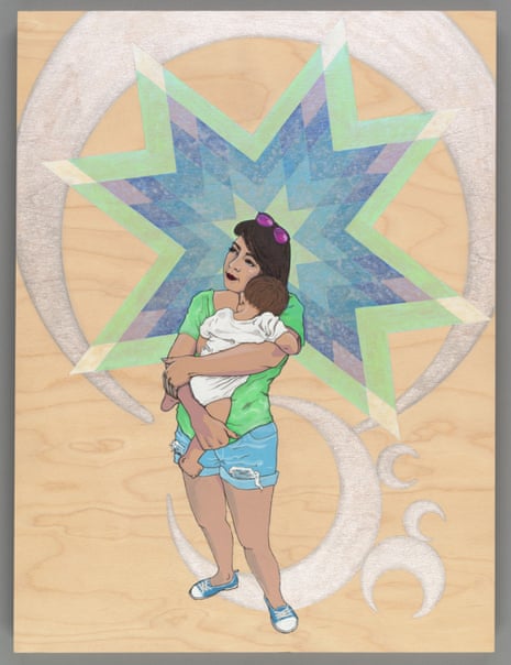a woman holding a baby