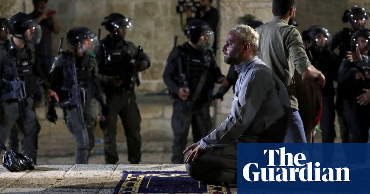 Israeli police attack Palestinians at al-Aqsa mosque in eviction protests – video