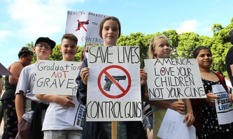 Protesters call for strict gun control in Sydney’s Hyde Park on Saturday in a march to show solidarity with victims and survivors of US gun violence. 