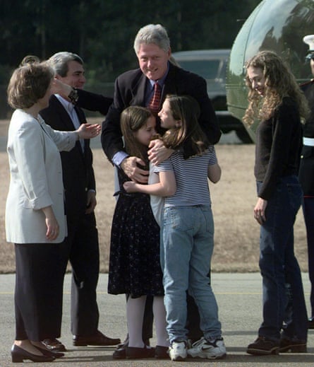 Bill Clinton is greeted by the Lader family upon arrival in Hilton Head, South Carolina, on 30 December 1996, for the annual intellectual retreat known as ‘renaissance weekend’ that was founded by the Laders.
