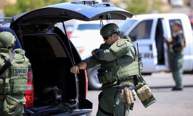 Police SWAT team members in the aftermath of a mass shooting at a Walmart in El Paso, Texas