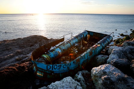 An abandoned boat that was used recently to transport Cuban migrants from the island nation to the US on 6 January 2023 in Key West, Florida.