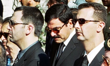 Assad with his brother Maher (left) and brother-in-law Asef Shawkat (centre) during funeral of late President Hafez al-Assad in Damascus in June 2000.