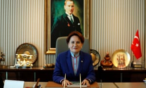Meral Aksener sits in front of a portrait of the founder of the Turkish republic, Mustafa Kemal Ataturk, in the Ankara headquarters of her İyi (Good) party