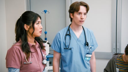 Two medical staff, one female and one male, in a still from US TV series St Denis Medical