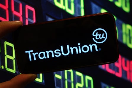 In this photo illustration, the TransUnion company logo is seen displayed on a smartphone screen.