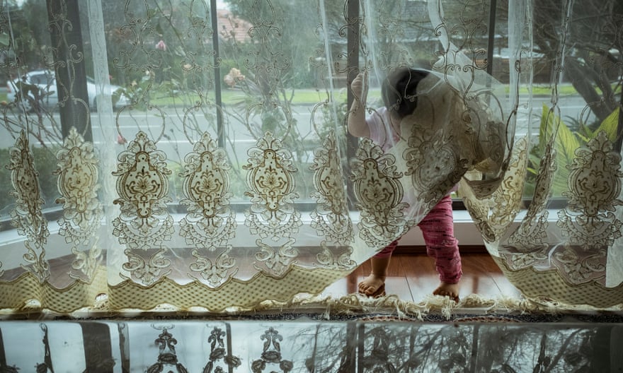 Diana plays behind a curtain