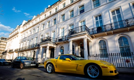 Cars and houses in Eaton Square, London