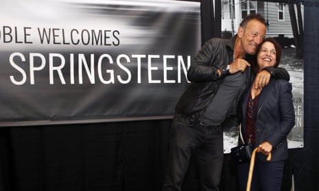 Bruce Springsteen, left, greets a fan at the launch of his autobiography at the Barnes &amp; Noble in the New Jersey town where he grew up.