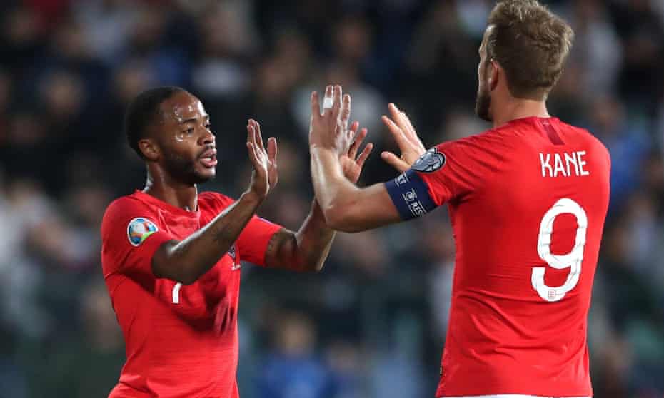 Raheem Sterling (left) celebrates scoring his second and England’s fifth goal with Harry Kane.