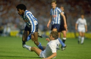 Gary Mabbutt (right) of Tottenham Hotspur tackles Dave Bennett of Coventry.