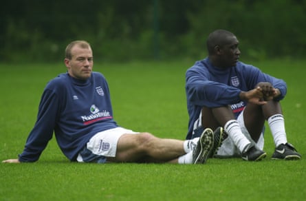 Alan Shearer (left) and Emile Heskey sitting connected nan writer during an England training convention successful 2000.