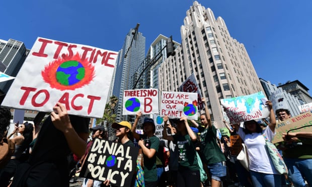 Thousands of youth demand action as part of a global climate strike in Los Angeles on Friday. 