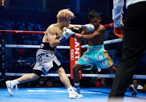 Reito Tsutsumi (left) takes on Raymundo Rojas during their super-featherweight bout on Saturday night in Riyadh. Tsutsumi won by second-round stoppage.