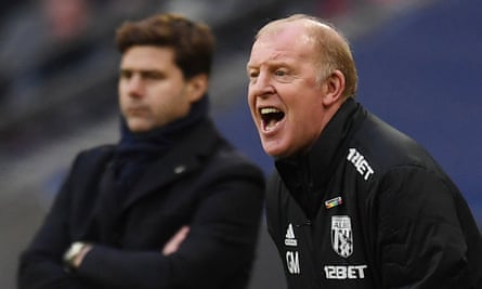 West Brom interim manager Gary Megson (R) with Tottenham manager Mauricio Pochettino (L) during Saturday’s game at Wembley.