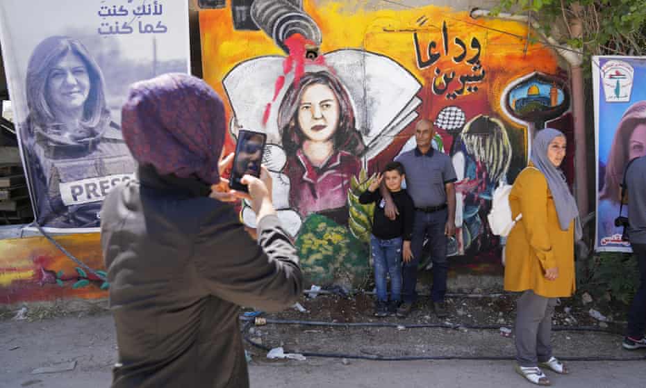 Palestinians visit the site where Shireen Abu Aqleh was shot and killed, in the West Bank city of Jenin
