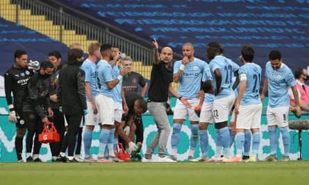 Pep Guardiola tries to lift his Manchester City team during the second-half drinks break of their FA Cup semi-final defeat by Arsenal