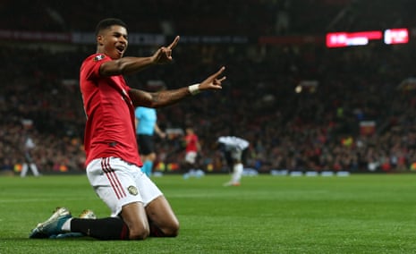 Marcus Rashford celebrates scoring Manchester United’s third.
