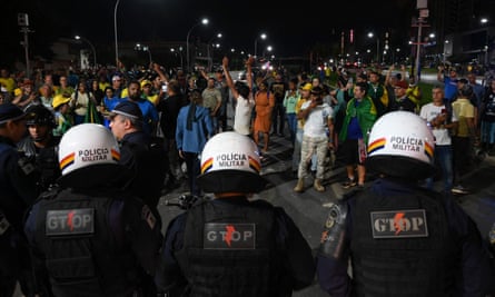 Bolsonaro supporters confront military police in Brasília