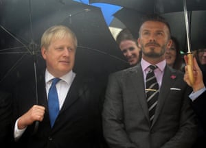 Boris Johnson, then London’s mayor, attends the Olympic flame ceremony in Athens alongside David Beckham in 2012.