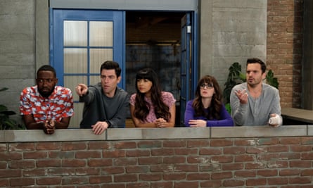 Five cast members of New Girl on a balcony