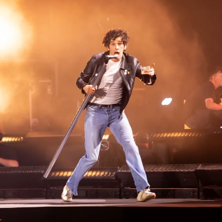 Matty Healy with a pint of Guinness.