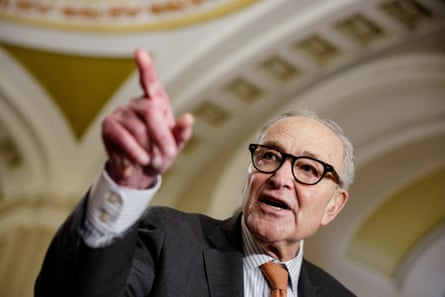 Chuck Schumer points while speaking in the capitol