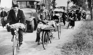 People with loaded bicycles and trucks during the evacuation of Paris in 1940 3641.jpg?width=300&quality=85&auto=forma