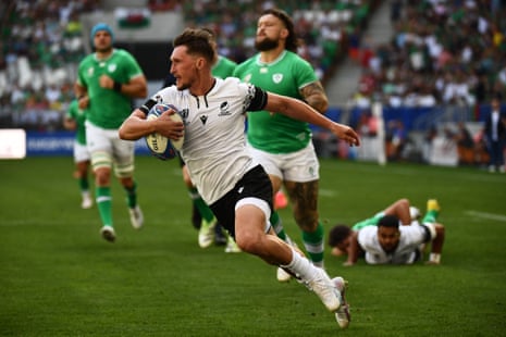 Romania's scrum-half Gabriel Rupanu runs to score a try during the France 2023 Rugby World Cup Pool B match between Ireland and Romania at Stade de Bordeaux.