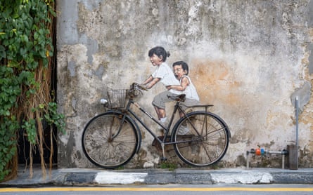 Ernest Zacharevic’s Children on a Bicycle mural in Penang, Malaysia.