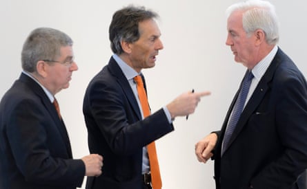 Craig Reedie, right, with, from left, Thomas Bach, president of the International Olympic committee, and its director general, Christophe de Kepper, at an executive board meeting, Lausanne, 2016.