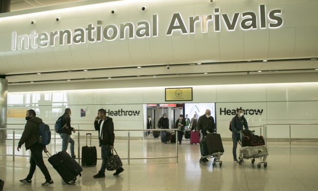 Travellers arriving at Heathrow airport’s Terminal 2 on Monday. 