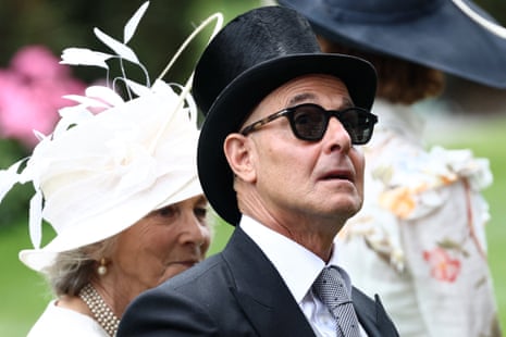 Actor Stanley Tucci arrives by horse and carriage during the Royal procession.