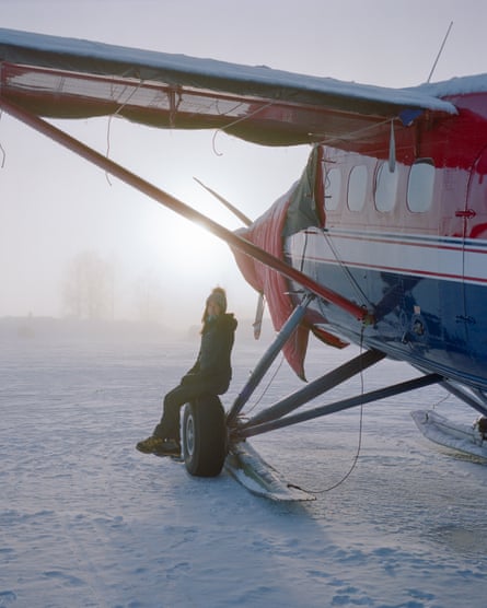 Glacier pilot Leighan Falley, 41, waits for fog to lift in Talkeetna, Alaska. Falley, who spent nine years guiding climbers on Denali, flies primarily in the Alaska Range for Talkeetna Air Taxi.