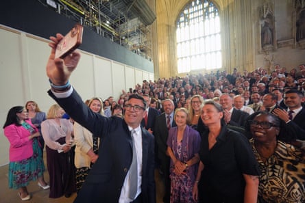 Burnham taking a selfie with colleagues from the parliamentary Labour party in Westminster Hall at the Houses of Parliament.