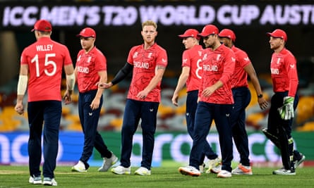 The Aramco logo can be seen on the pitchside advertising billboards at the Gabba, as England bowler Ben Stokes (centre) and his team-mates take part in their T20 World Cup warm-up match against Pakistan.