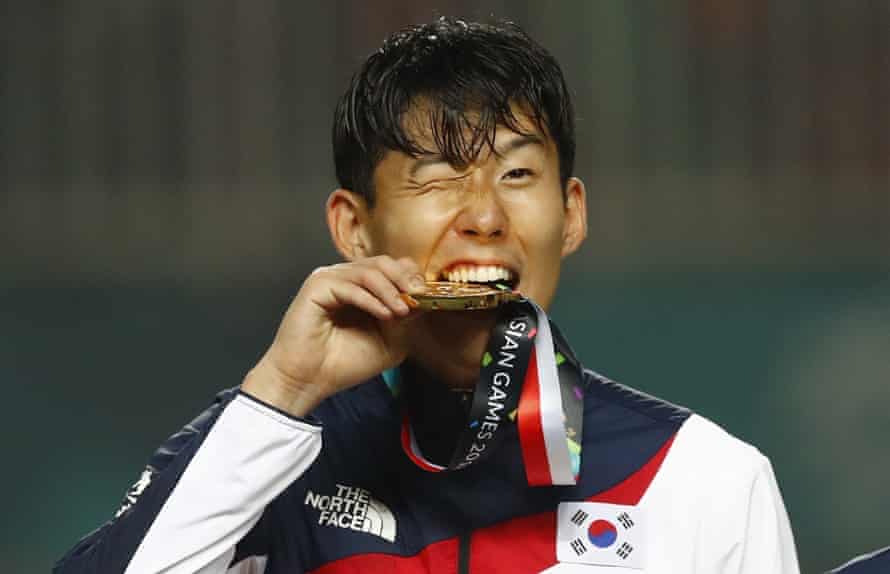 Son Heung-min celebrates after winning gold at at the Asian Games in Indonesia in September 2018.