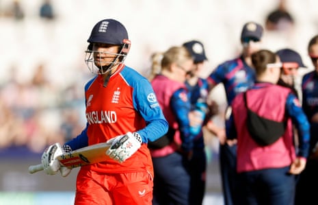 Sophia Dunkley walks after losing her wicket.