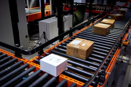 Cardboard packages on a conveyer belt