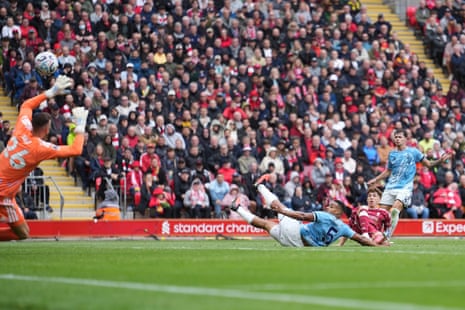 Nottingham Forest's goalkeeper Matz Sels (left) fails to save a shot from Liverpool's Victor Munoz (second right) which finds the back of the net and makes it 2-2.
