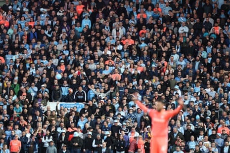 Coventry City fans watch from the stands at Ewood Park, Blackburn.