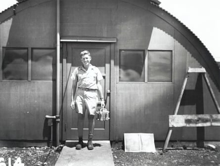 Harold Agnew holds the plutonium core of the ‘Fat Man’ bomb dropped on Nagasaki.