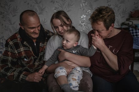 Nadiya Neschcheryakova, right, with her husband, Yuriy, left, on either side of their daughter Kateryna and grandson Andriy.