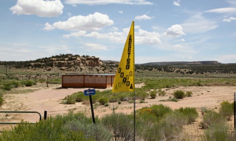 A protest sign saying "No Mining" in Navajo is seen next to the entry to Northeast Church Rock abandoned uranium mine in Pinedale, New Mexico.