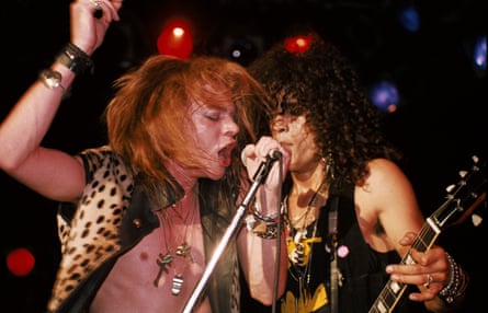 Axl Rose and Slash onstage in LA in 1986.
